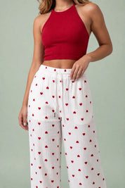 Pantalon blanc taille haute imprimé cœurs | Vue rapprochée | Lounelle Paris