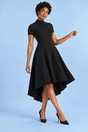 Robe midi asymétrique à col montant noire | Vue en mouvement | Lounelle Paris