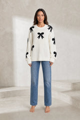 Pull blanc cassé motifs nœuds