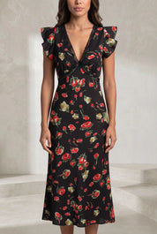 Robe noire florale à volants | Lounelle Paris